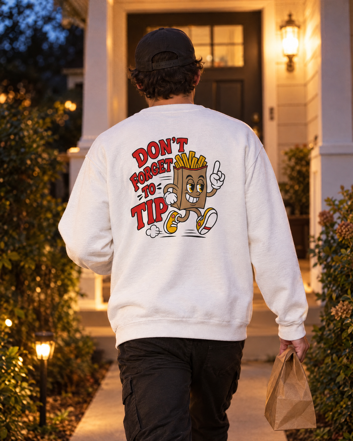 Driver wearing the Don’t Forget to Tip fry man crewneck, back view